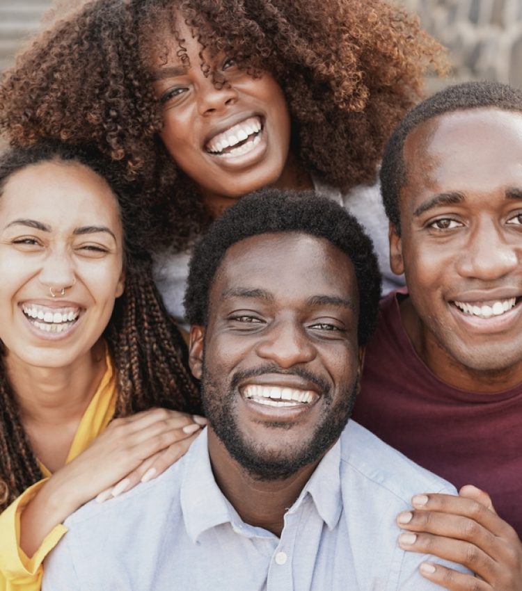 Goup,Of,Young,African,People,Smiling,On,Camera